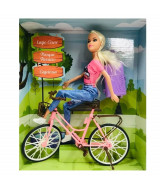 MUÑECA TINY Y SU BICICLETA VIAJERA C/ACCESORIOS 34 x 28 x 8cm. - 53  